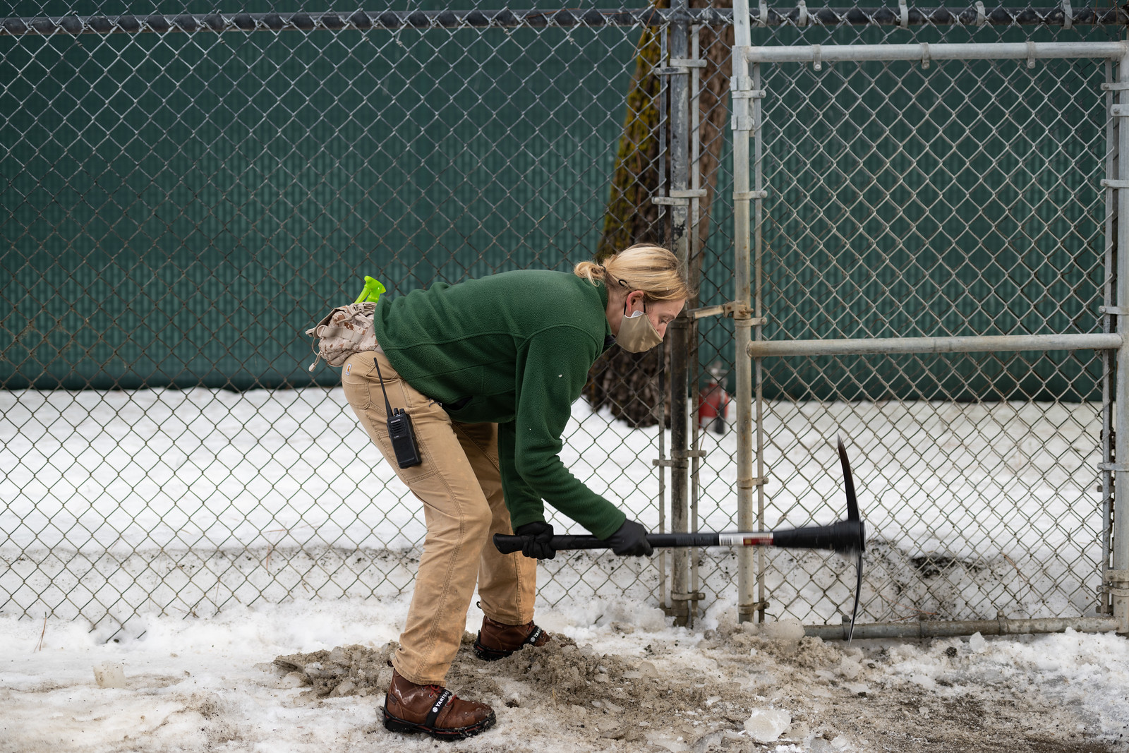 clearing the ice so gates can open and close